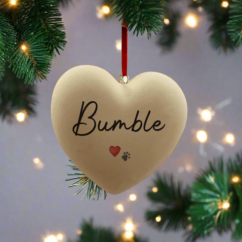 A Personalised Paw Print & Heart Ceramic Heart Bauble